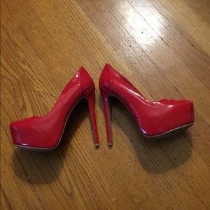 Red closed toe heels.